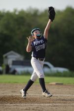 a child catches a baseball