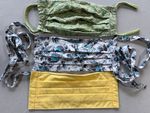 three colorful fabric masks