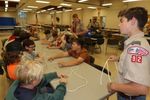 Scouts working on tying knots