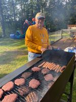 a older man grilling