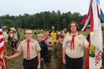 children and teens in scout uniforms