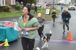 people cross the finish line