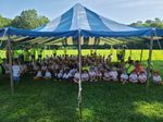 Children under a large tent