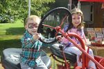 two children on a tractor