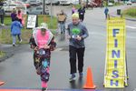two people cross the finish line